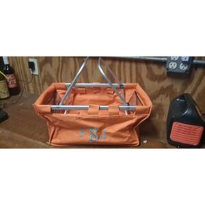 orange monogrammed market tote with a collapsible aluminum frame